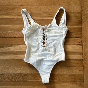 White lace up one piece bathing suit